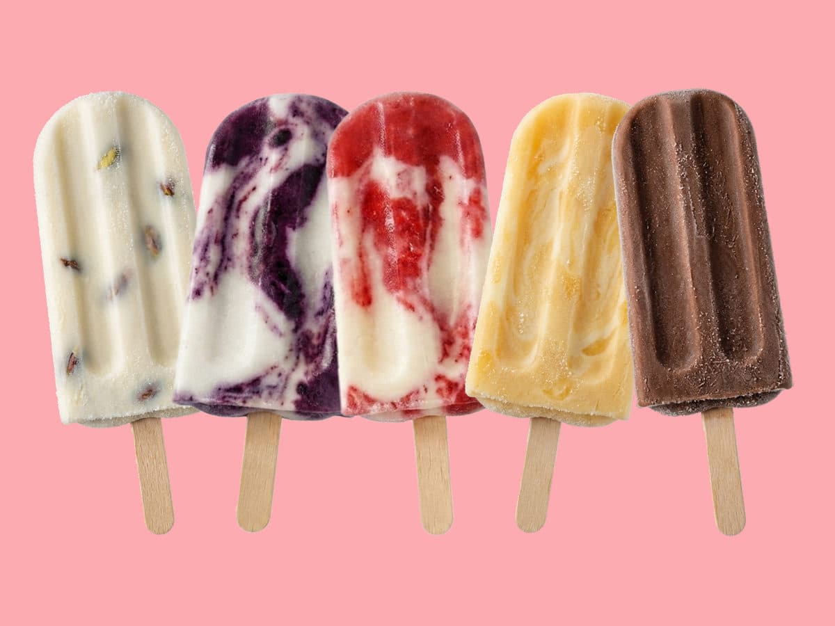 Rimlawi popsicles in a row: ashta, ashta and mulberry, ashta and strawberry, ashta with mango and honey, and chocolate