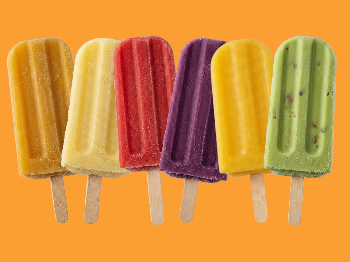 Rimlawi popsicles in a row: pineapple, lemon, strawberry, Levantine mulberry, mango and pistachio